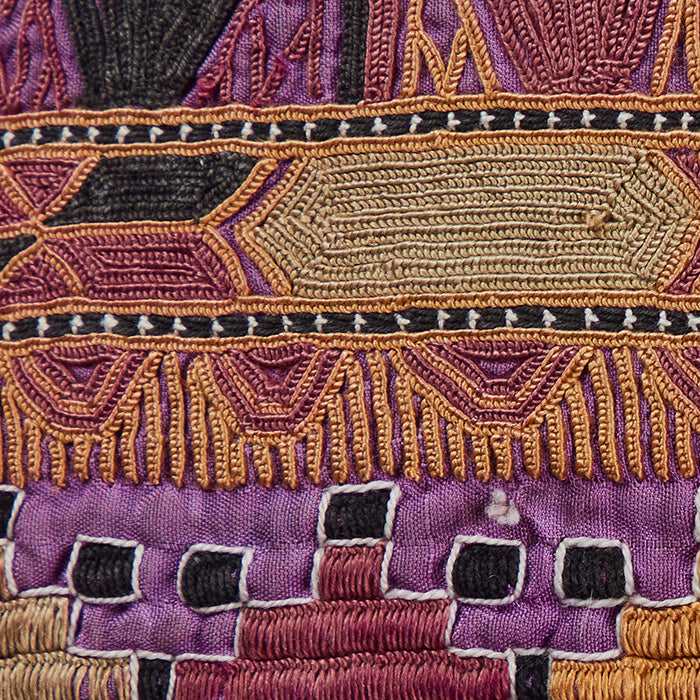 (FABRIC DETAIL) Antique Afghani Pashtun Embroidered Pillow. Intricately embroidered silk on cotton. Sleeve fragment from Pashtun tribal men's tunic. Black linen back, invisible zipper closure and feather and down fill. Two available. Priced individually. 11" x 14"