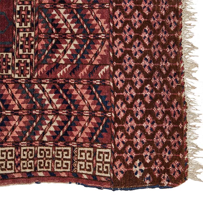 (LEFT CORNER DETAIL) Antique Turkoman Rug. Late 19th C. Hand knotted wool. Even pile. Classic geometric Turkoman design with natural dyes. Uzbek or Afghani. 46" x 56"