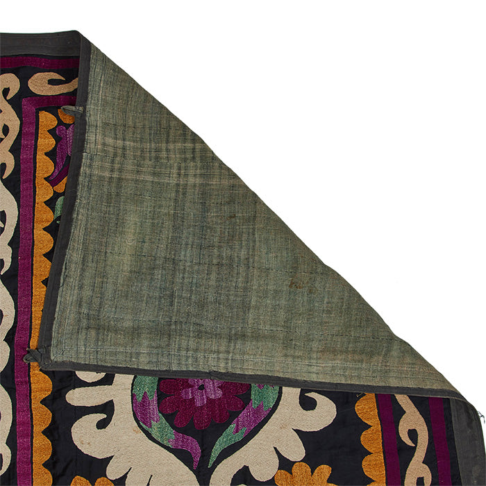 (DETAIL BACK) Antique Uzbek Suzani. Early 20th C. hand embroidered wall hanging. Original dowry piece. Backed as shown and cloth loops for hanging. Central Asia. 49" x 33"