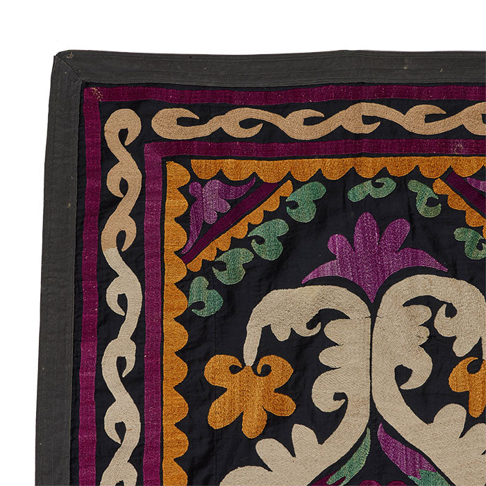 (DETAIL LEFT) Antique Uzbek Suzani. Early 20th C. hand embroidered wall hanging. Original dowry piece. Backed as shown and cloth loops for hanging. Central Asia. 49" x 33"