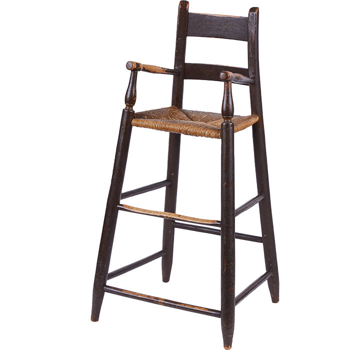 Early American Child's High Chair. Late 18th C. chair with original finish and replaced cane seat.