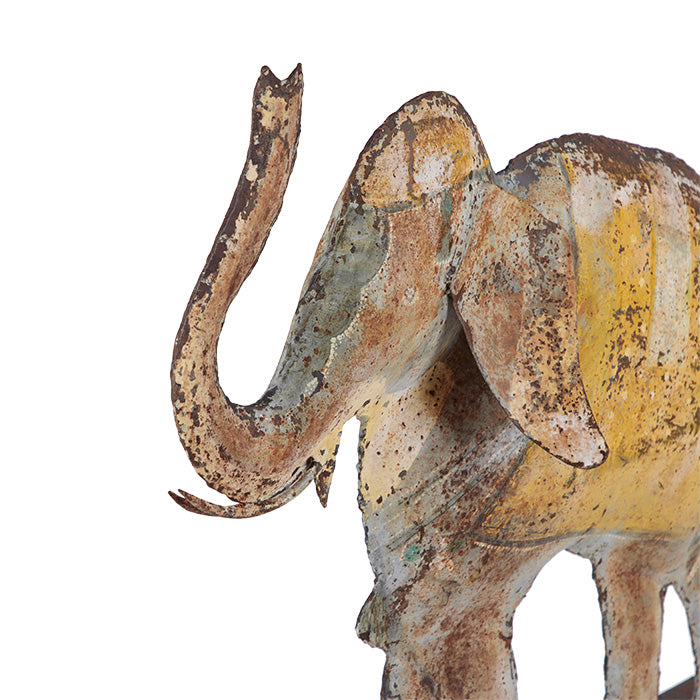 (ANGLE PERSPECTIVE) Folk Art Tin Elephant. Hand crafted. Distressed paint finish on front and back. 26" x 23" x 5"