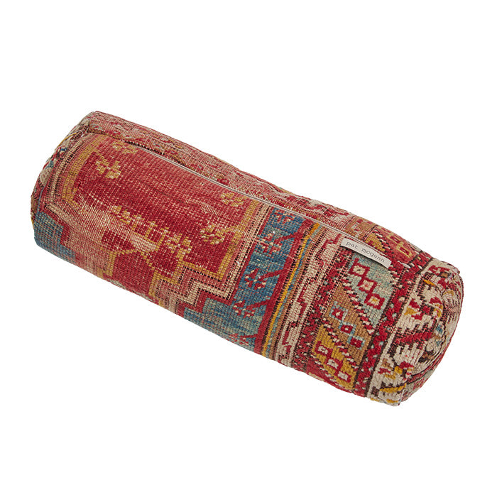 (BACK ZIPPER VIEW) Turkish Rug Bolster Pillow II. Vintage Turkish village rug reconfigured into a bolster pillow. Zipper closure and feather and down fill. Two available. Priced and listed individually. 6" x 18"