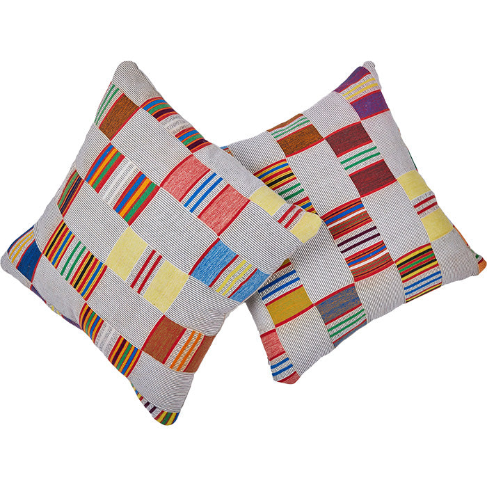 (TWO PILLOWS) African Ewe Cloth Pillow. From Ghana. Hand spun and strip-woven Ewe cloth with multi-color supplementary weft embroidered stripes. Natural linen back, invisible zipper closure, feather and down fill. Several available with different stripe configurations as shown. 20" x 20"