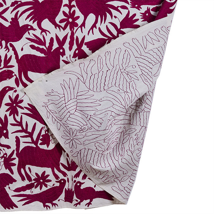 (DETAIL BACK) Embroidered Otomi Textile IV. Contemporary hand embroidered panel made in Mexico. Table cloth, throw, etc. Magenta cotton floss on off-white cotton. 72" x 72"