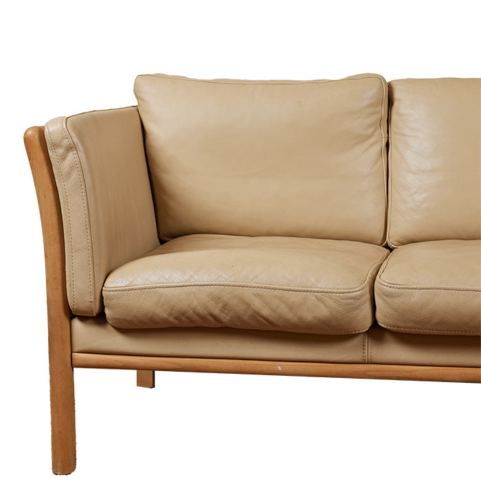 (LEFT SEAT) 3 Seat Scandinavian Leather Sofa II. Late 20th C. cream colored leather sofa with pale wood frame. 75" W x 31" H