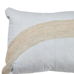 (CORNER DETAIL) African Embroidery Pillow. White and beige stripe. Made from a vintage Hausa Chief’s Robe, known as a Boubou. Hausa is the largest tribal group in Nigeria. Floss hand embroidery over white handwoven cotton. Natural linen back, invisible zipper closure, feather and down fill. 15" x 33"