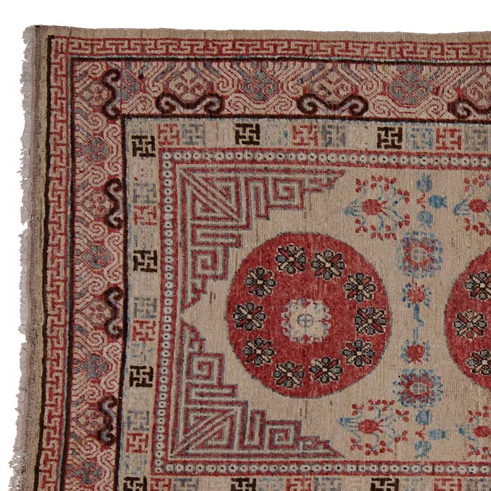 (CORNER DETAIL) Antique Khotan Rug - Samarkand or Khotan knotted rug. Chinese motifs. Even pile and good condition. c1920. 101" x 57"