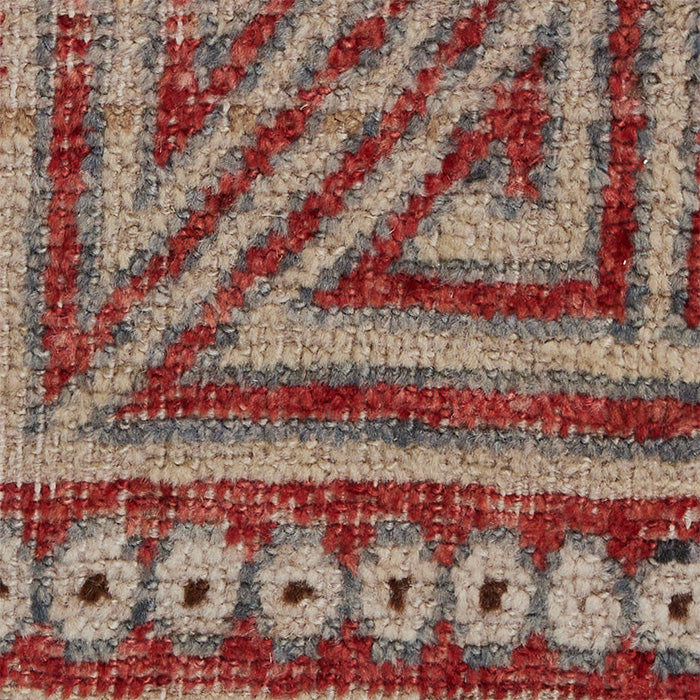 (RUG CLOSE UP) Antique Khotan Rug - Samarkand or Khotan knotted rug. Chinese motifs. Even pile and good condition. c1920. 101" x 57"