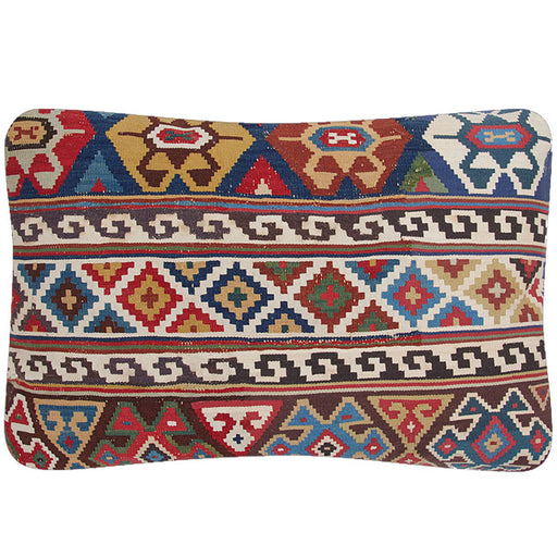 Antique Kilim Pillow II Caucasian kilim fragment reconfigured into a pillow. Finely woven wool flatweave. All natural and hand dyed wool.  Natural linen back, invisible zipper closure, feather and down fill. 17" x 25"