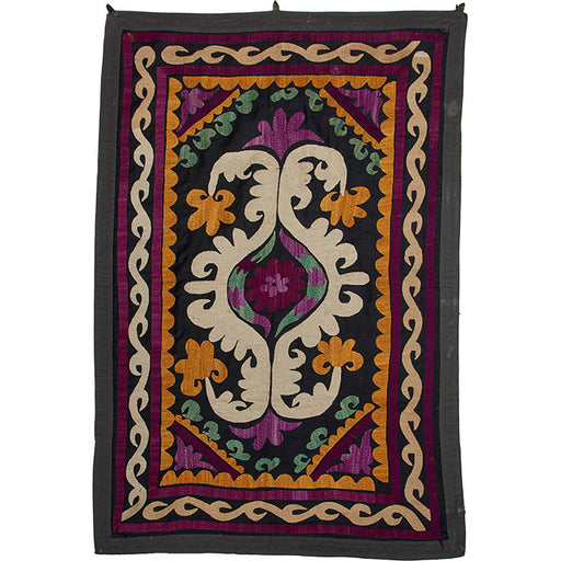 Antique Uzbek Suzani. Early 20th C. hand embroidered wall hanging. Original dowry piece. Backed as shown and cloth loops for hanging. Central Asia. 49" x 33"