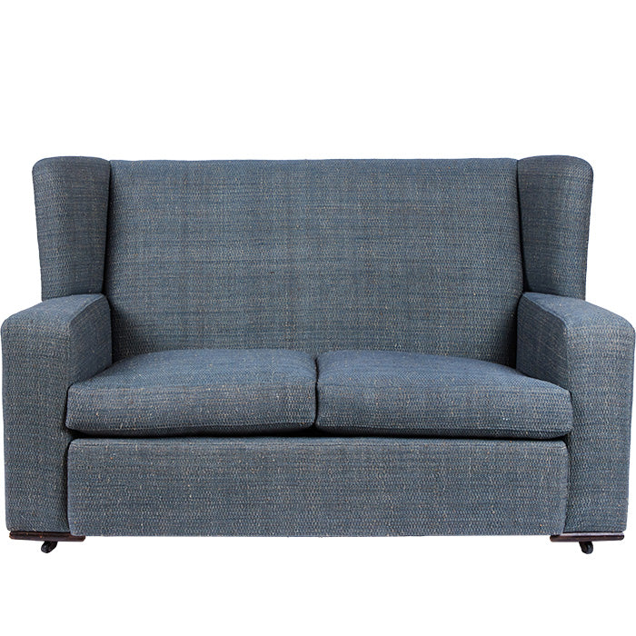 Art Deco Love Seat with French upholstery fabric in Eye Blue. 1930s design on wooden wheels.