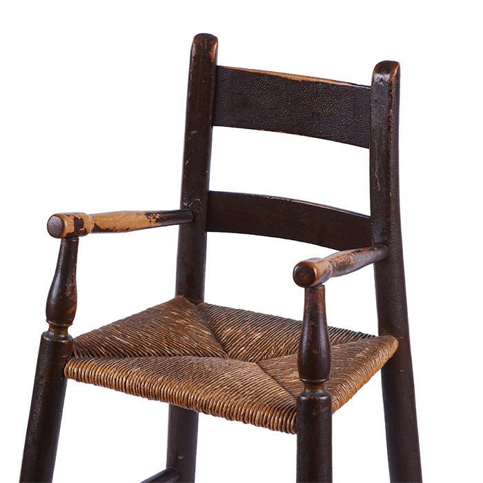 (CHAIR DETAIL) Early American Child's High Chair. Late 18th C. chair with original finish and replaced cane seat.