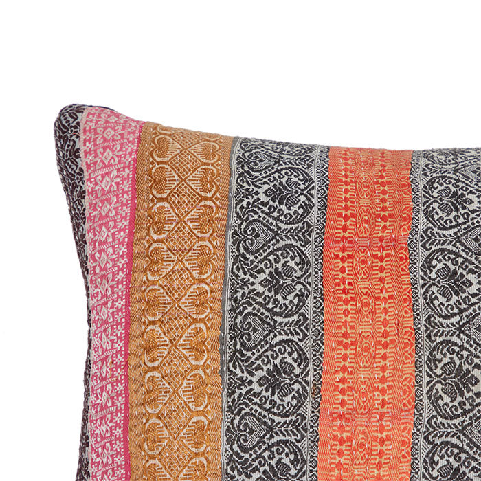 (CORNER DETAIL) Indian Sari Trim Pillow II. Vintage silk ribbon sari trims reconfigured into fabric.  Black linen back, invisible zipper closure, feather and down fill. 14" x 28"