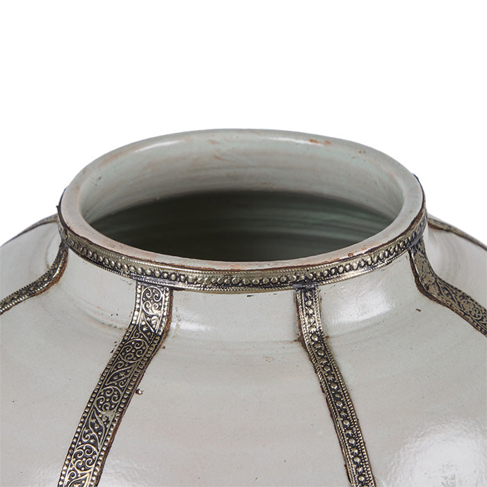 (MOUTH TOP DETAIL) Large Moroccan Storage Vessel. 18" high terra cotta urn with white glaze and Moorish metal filigree strips. Some cracks in glaze as shown. 18" H x 19" D