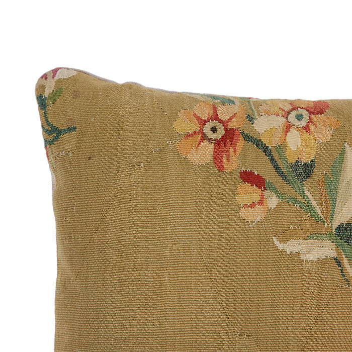 (CORNER DETAIL) Antique Tapestry Pillow III. 18th C. European tapestry fragment pillow. Assorted European blossoms on muddy gold. Natural linen back, invisible zipper closure, feather and down fill. 14" x 16"