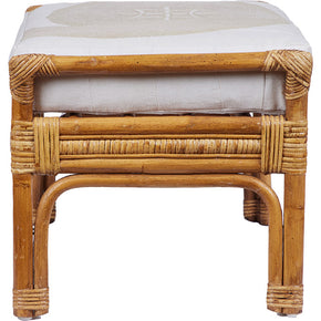 (SIDE LEGS DETAIL) Rattan Ottoman with African Embroidery Upholstery. Vintage ottoman with double-sided cushion in embroidered white cotton.