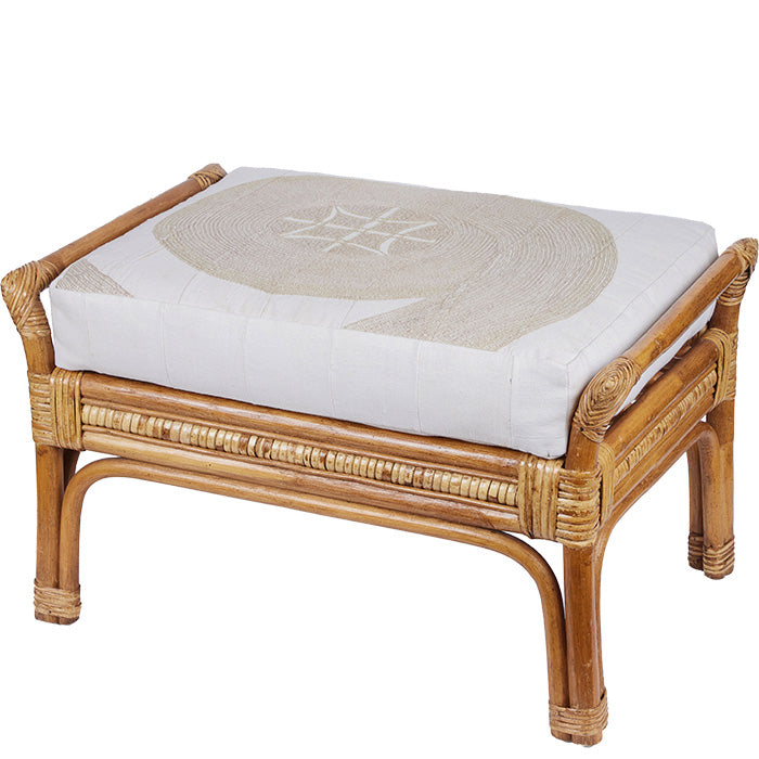 Rattan Ottoman with African Embroidery Upholstery. Vintage ottoman with double-sided cushion in embroidered white cotton.