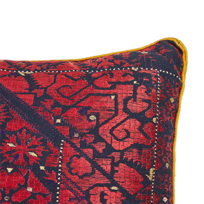 (DORNER DETAIL) Swat Valley Pillow. Red silk floss embroidery on black cotton. Vintage from Pakistan. Back also embroidered. Invisible zipper closure, filled with feather and down.