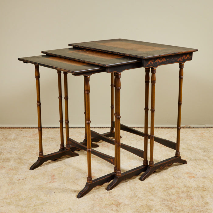(DETAIL DISPLAY) Chinoiserie Set of 3 Nesting Tables.  Three antique nesting tables with faux bamboo legs and painted details on tops. Sturdy with age appropriated distressed paint. Antique Chinoiserie furniture. 30" H x 28" W x 18" D 