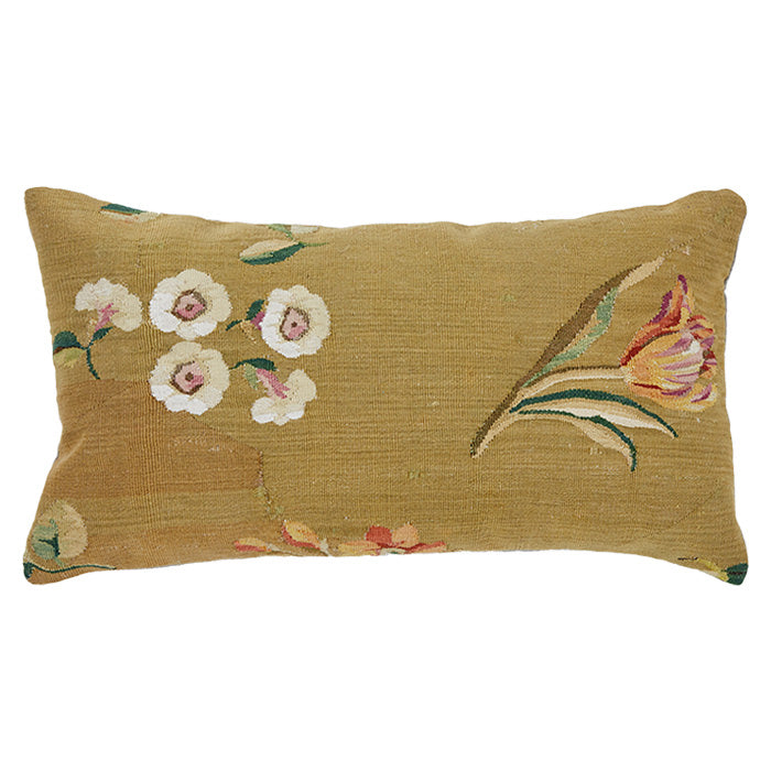 18th C. European tapestry fragment pillow. Assorted European blossoms on muddy gold. Natural linen back, invisible zipper closure, feather and down fill.  Priced individually. 10" x 19"