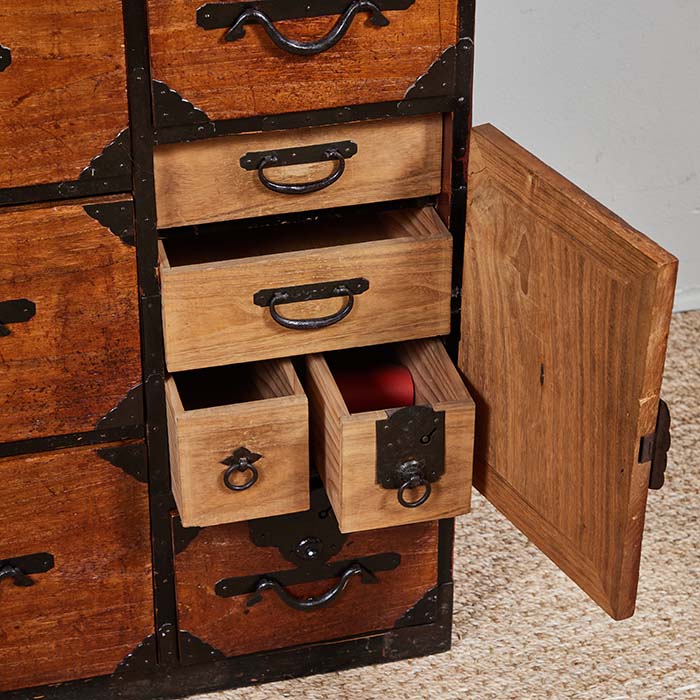 (DETAIL DRAWERS) Antique Japanese Tansu. 19th C. one-piece Japanese tansu with all original hand wrought hardware. Includes a key for the drawers. Age appropriate wear to the original finish. 42" W x 16" D x 36" H