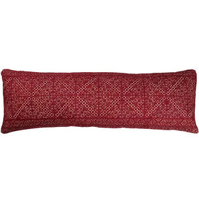 Bolster pillow made from antique Moroccan textile from the city of Fez. Intricate all-over silk floss on linen embroidery produces a durable fabric. The design is based on centuries old Mehindi (henna hand tattoo) designs. Natural linen back, invisible zipper closure, feather and down fill. 13" x 42"