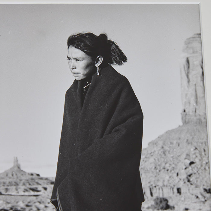 (DETAIL) Photograph by Josef Muench. Native American Woman in Monument Valley. Noted photographer Josef Muench (1904-1998) emigrated to US from Bavaria in 1928. Monument Valley was an oft repeated subject along with other southwest locals as well as international locations. Contemporary frame: 14" x 12". Image size: 9" x 8"