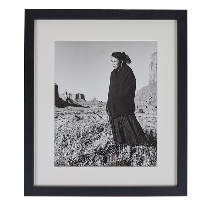 Photograph by Josef Muench. Native American Woman in Monument Valley. Noted photographer Josef Muench (1904-1998) emigrated to US from Bavaria in 1928. Monument Valley was an oft repeated subject along with other southwest locals as well as international locations. Contemporary frame: 14" x 12". Image size: 9" x 8"