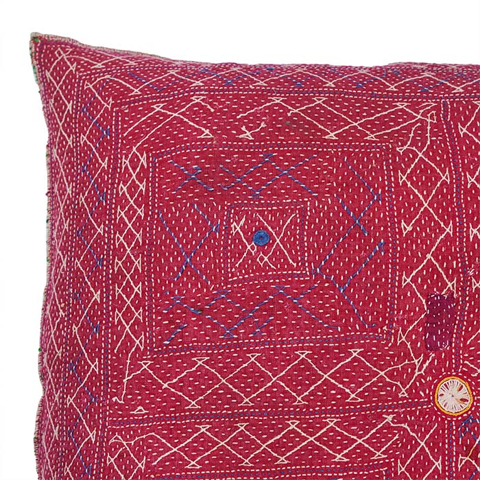 (DETAIL CORNER) Quilted Banjara Bag Pillow. All over hand quilting on hand woven cotton.  Vintage storage bag reconfigured into a pillow. Handmade in Gujarat State in India. Natural linen back. Zipper closure, feather and down fill. 20" x 20"
